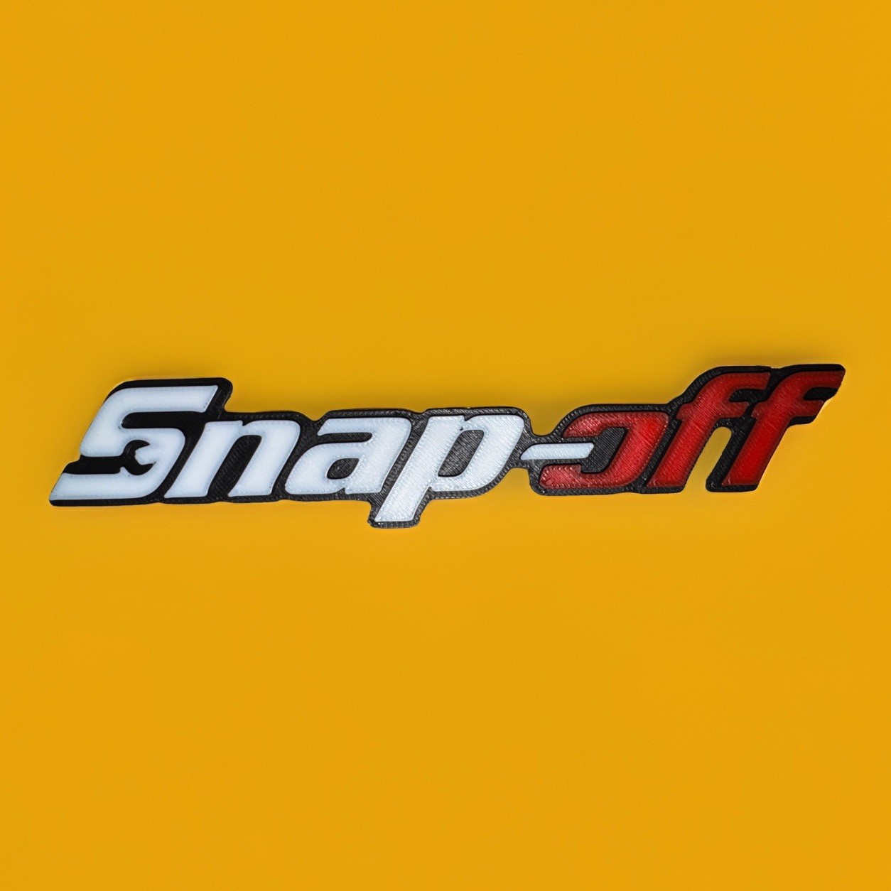 Snap-off Novelty 3D Printed Tool Box Badge.