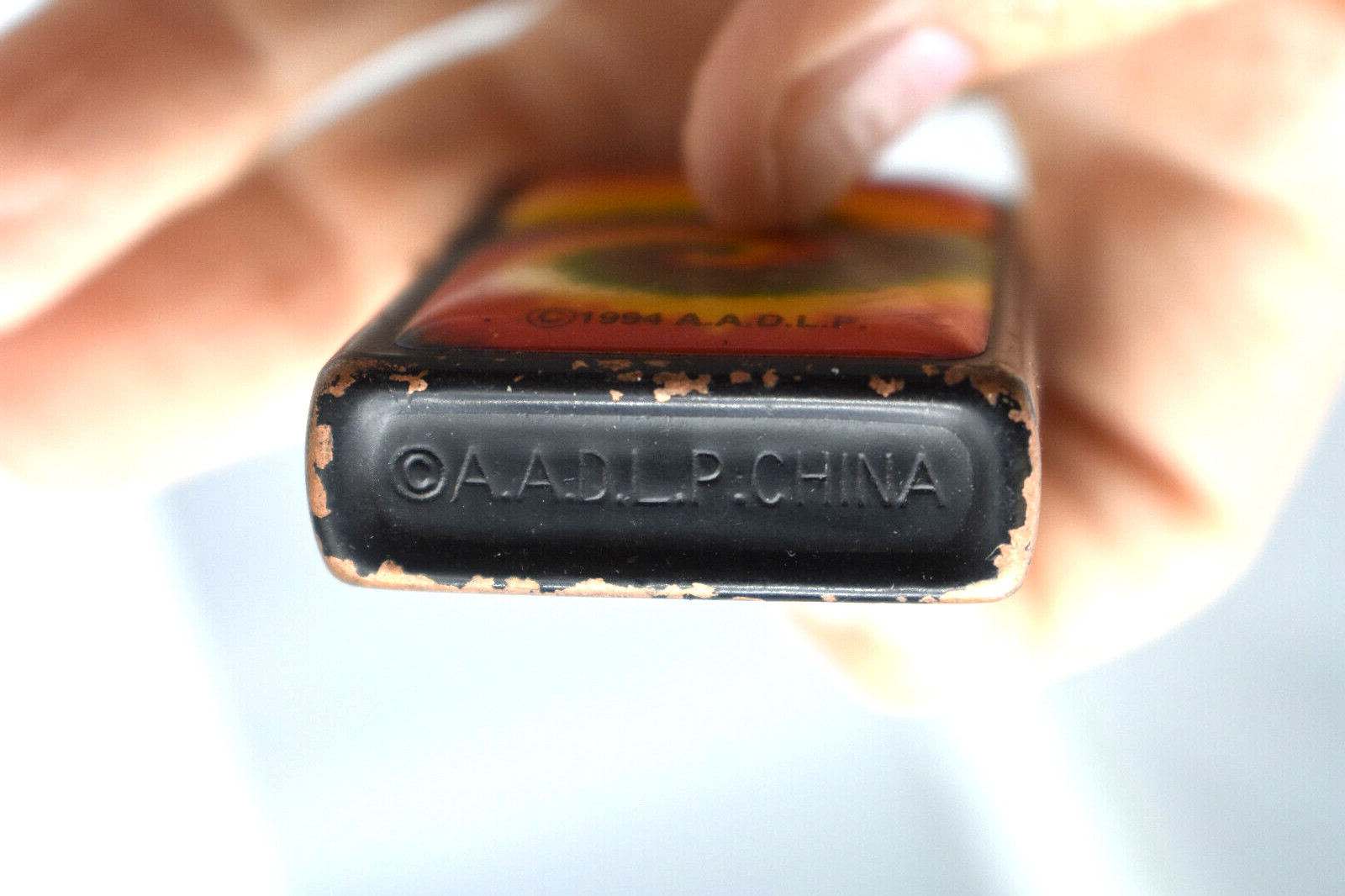 A.A.D.L.P Rainbow Colors Cigarette Lighter, Good Condition.