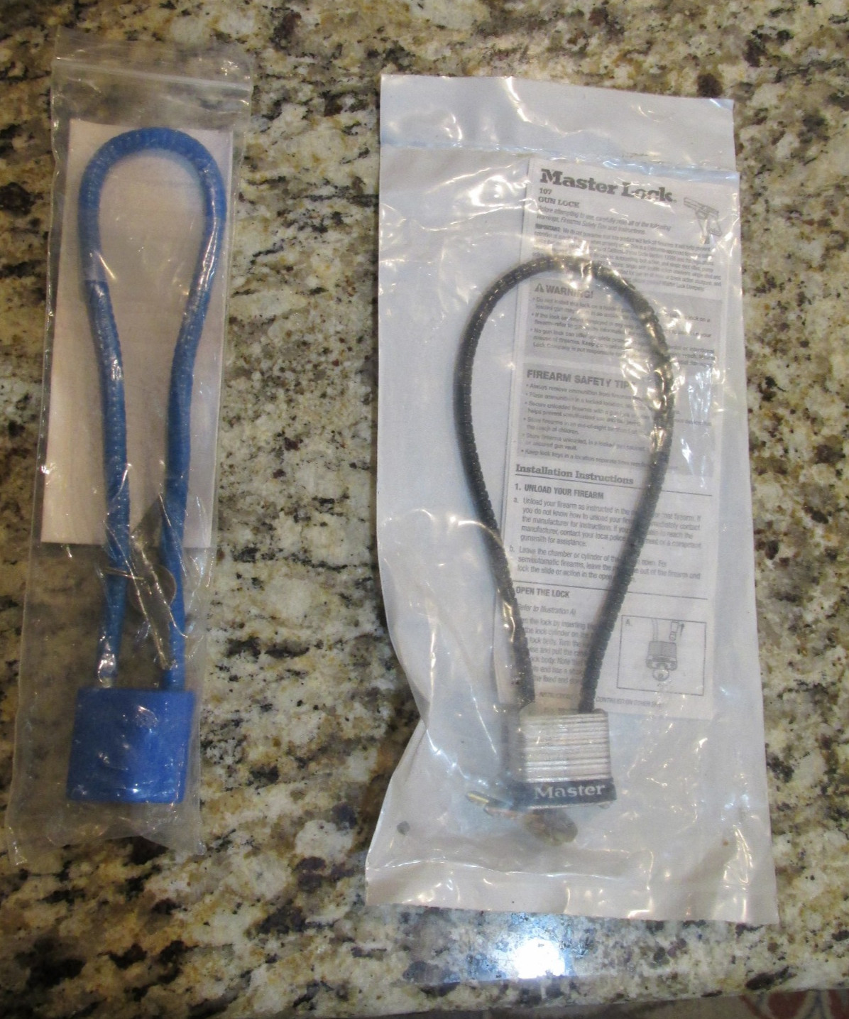 CABLE SAFETY LOCKS WITH KEYS BLACK MASTER LOCK BLUE GUN SAFETY LOCK LOT OF 2