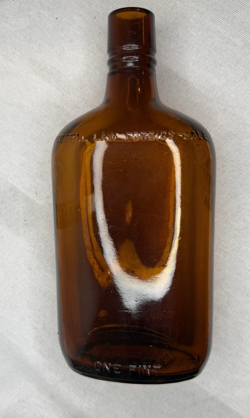 BROWN BOTTLE 1 PINT-EMBOSSED "FEDERAL LAW FORBIDS SALE OR REUSE OF BOTTLE" 8.25