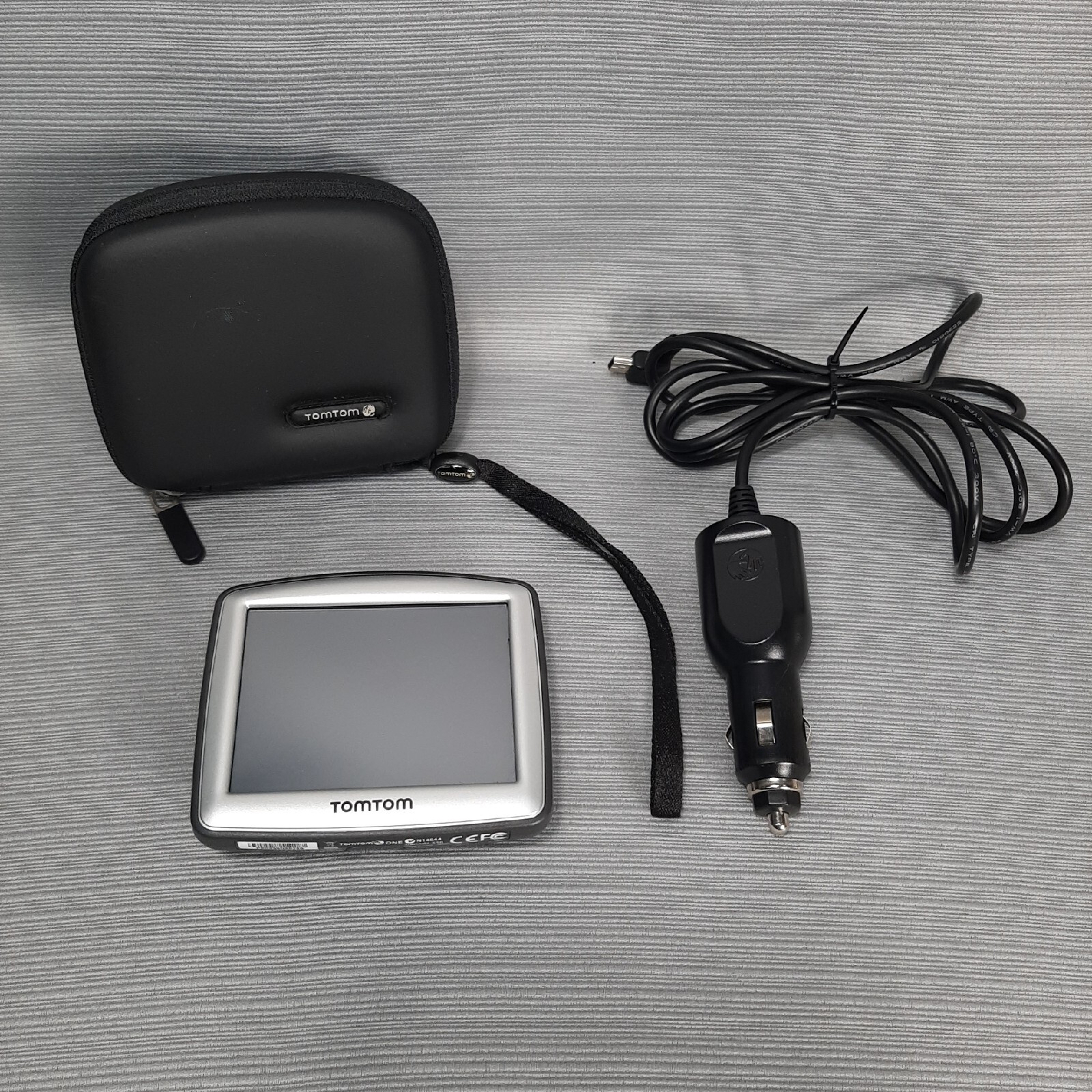 TomTom One N14644 GPS Bundle with Car Charger & Carry Case Tested