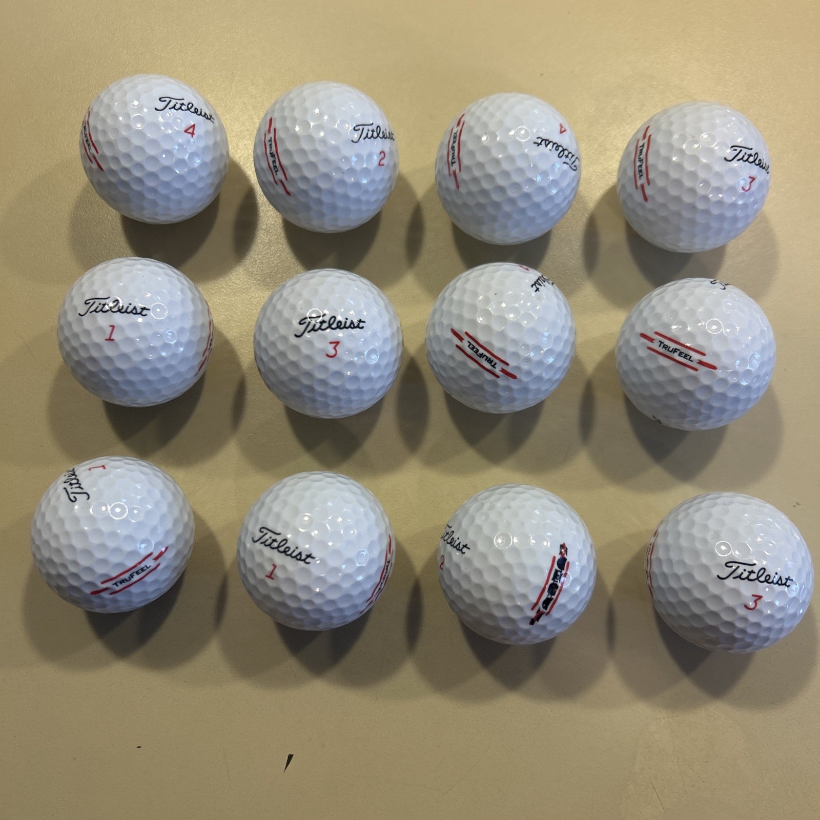 Dozen Mint (5A)AAAAA Titleist True Feel  Used Golf Balls