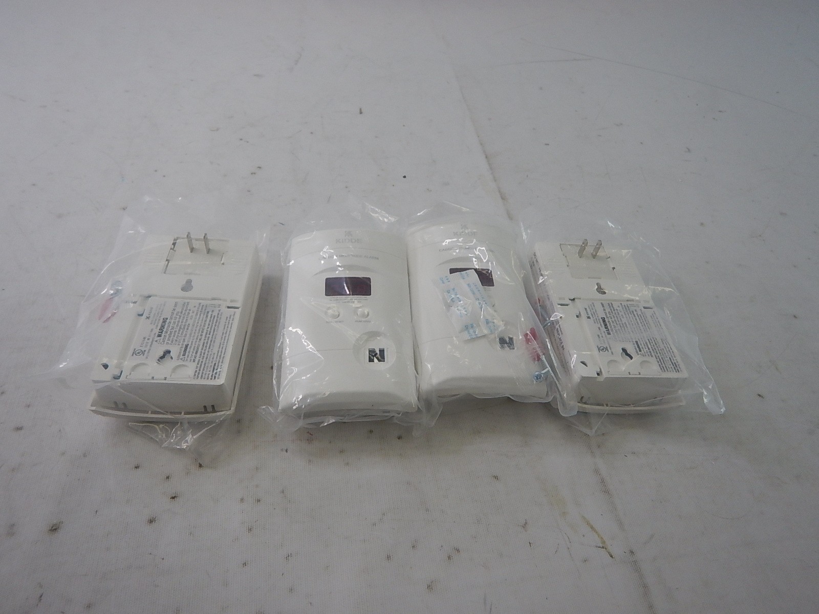 Kidde Carbon Monoxide Detector, Plug In Wall with 9-Volt Battery Backup, 4 Pack