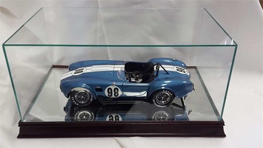 The 1:12 Scale Glass and Wood Display Case for Scale Model Cars by Mint Models