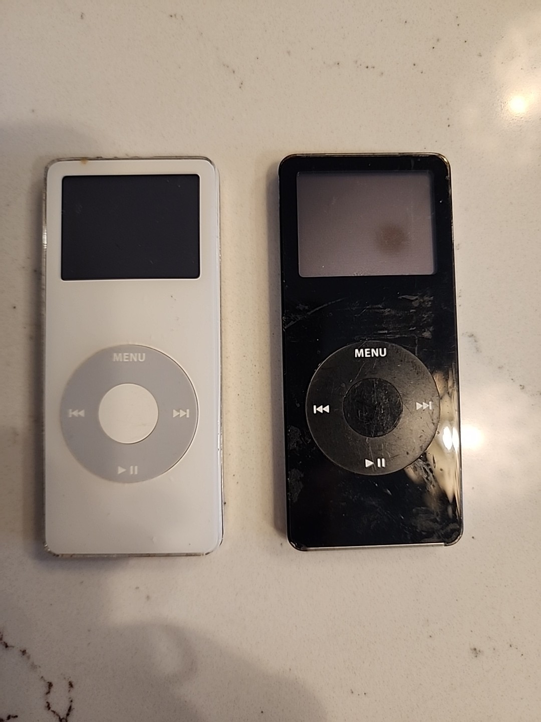 Apple iPod Nano-1st Generation -1 Black 1 White No Charger/Not Tested Bundle