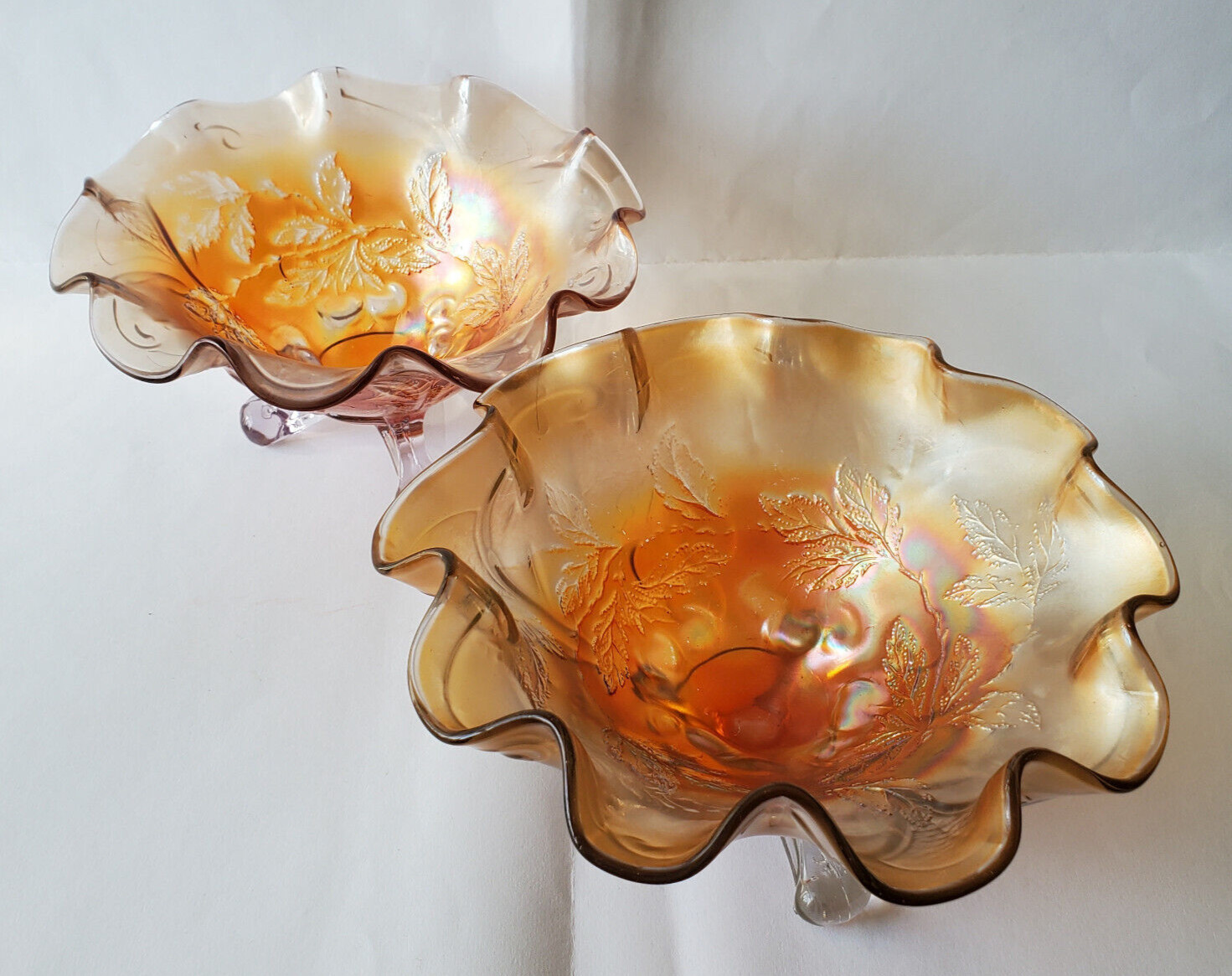 Lovely Pair of Antique Dugan Glass Cherries bowls in iridescent Marigold.