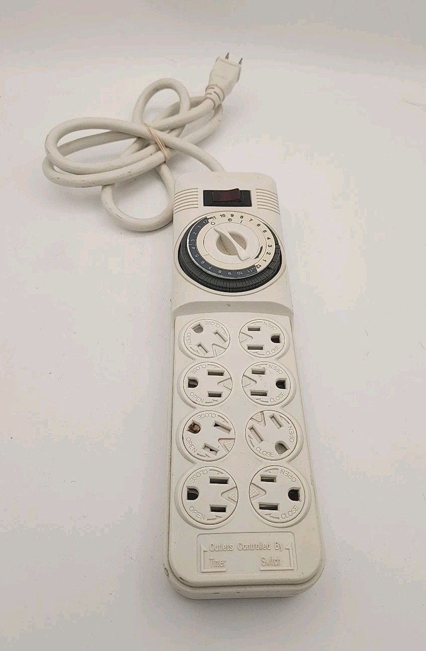 8 OUTLET PROTECTOR: SURGE TIMER + Reset Pre-owned