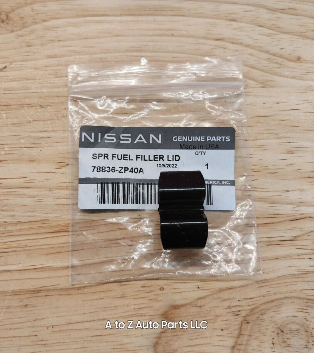 NEW 2006-2021 Nissan Frontier, Xterra, Pathfinder Gas Filler Door Spring, OEM