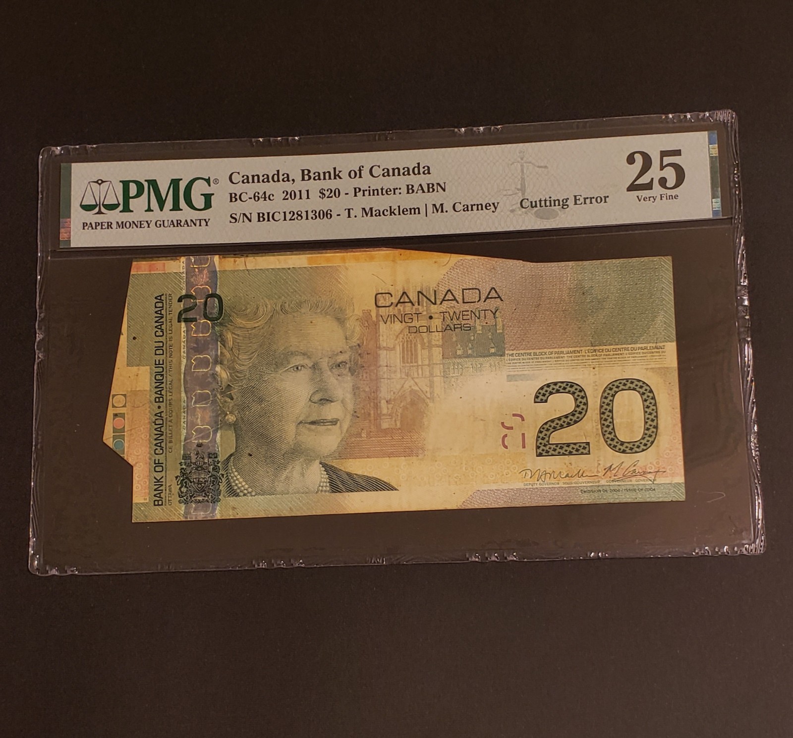 RARE ERROR 2011 Bank of Canada $20 Banknote. CUTTING ERROR. PMG Graded.