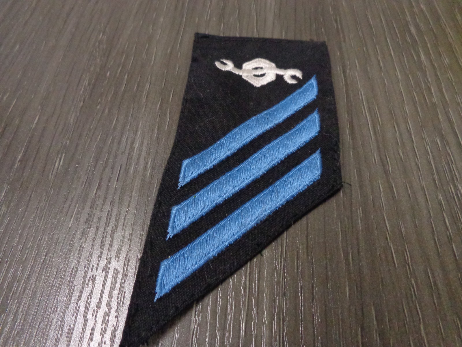US Navy - Enlisted Rank E-3, construction (Blue on black) CONSTRUCTION MECHANIC