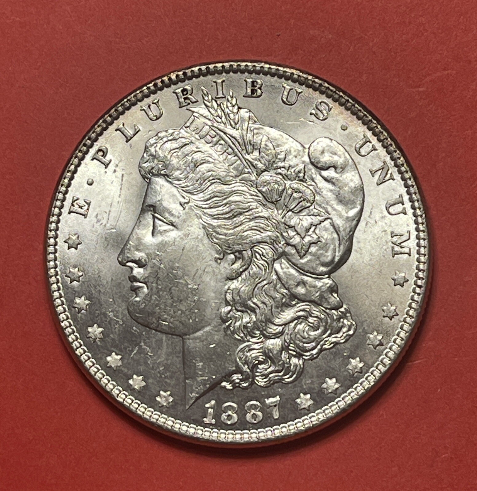 1887 P Morgan Silver Dollar, Choice to Gem Uncirculated.