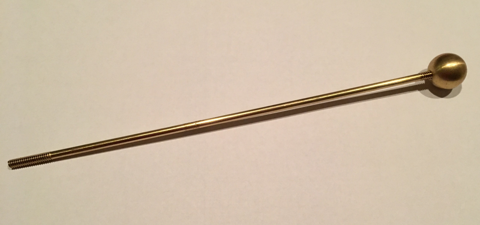 Image stabilizing brass Dob Rod for Binoculars