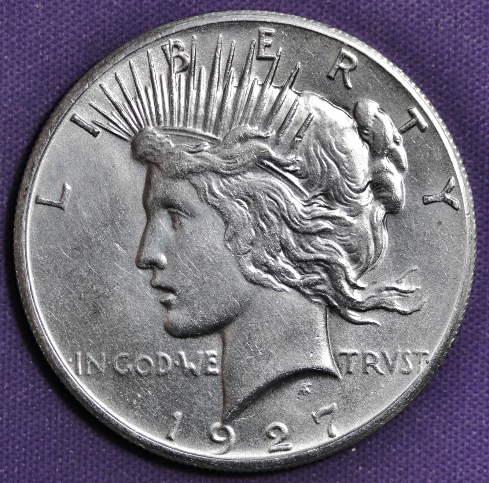 1927 Peace Silver Dollar.  BU Detail.  210310