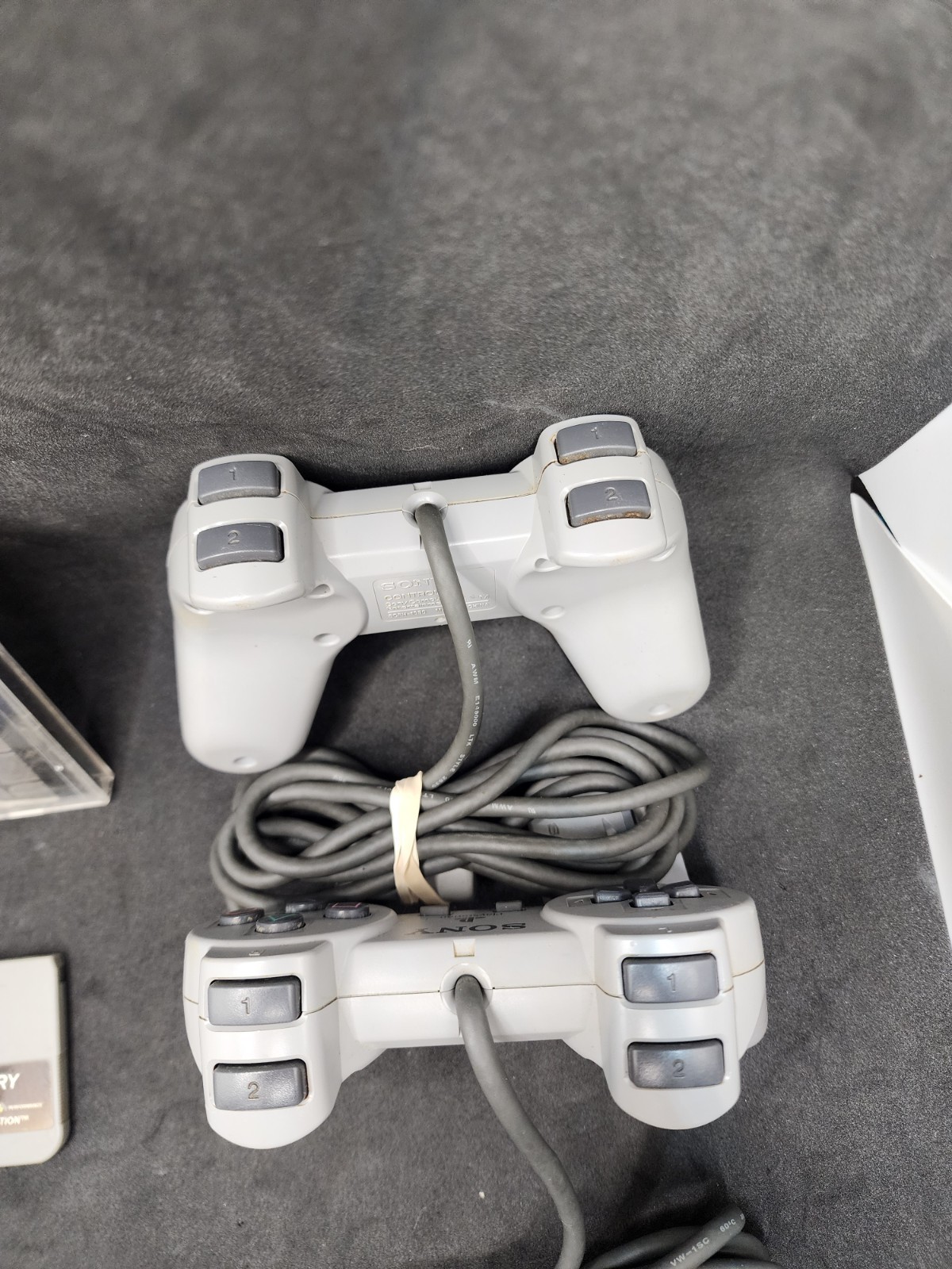 2 Playstation Controllers And 2 Memory Cards