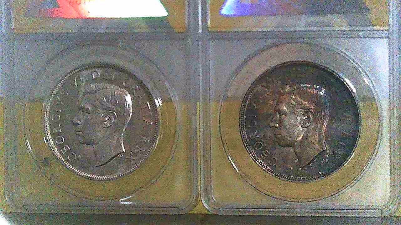 2-1952 Canadian 80% Silver Dollars . MS63 WL Toned and MS61 No WL.
