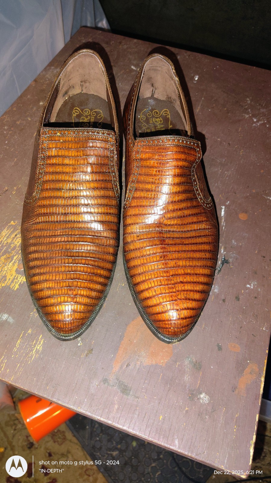 This is a vintage James A. Banister Co. brown lizard leather slip-on loafer .