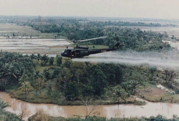 Vietnam  War  Photos --UH -1  Huey   - Spraying Agent Orange