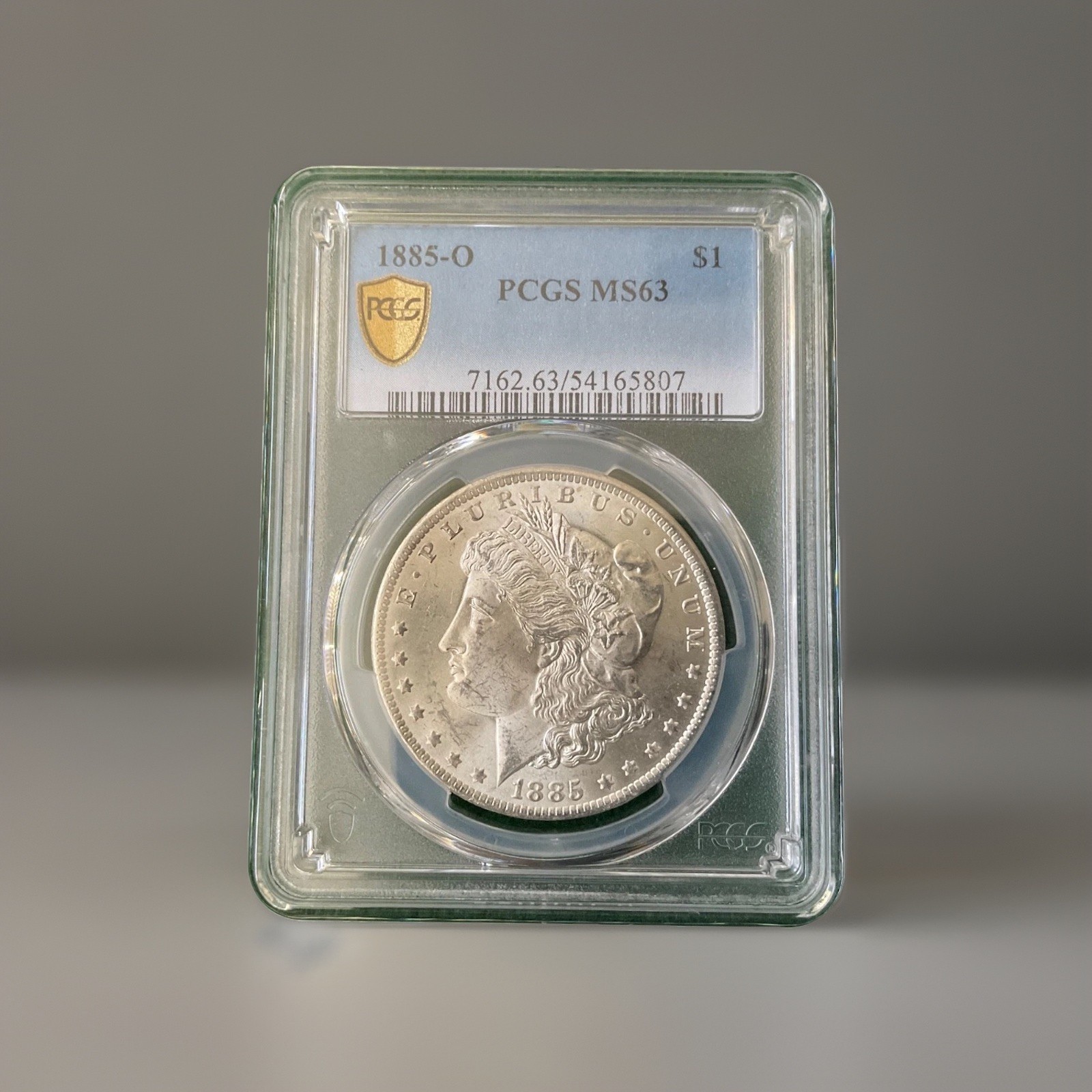 1885 O Silver Morgan Dollar PCGS MS63 Gold Shield - DJ