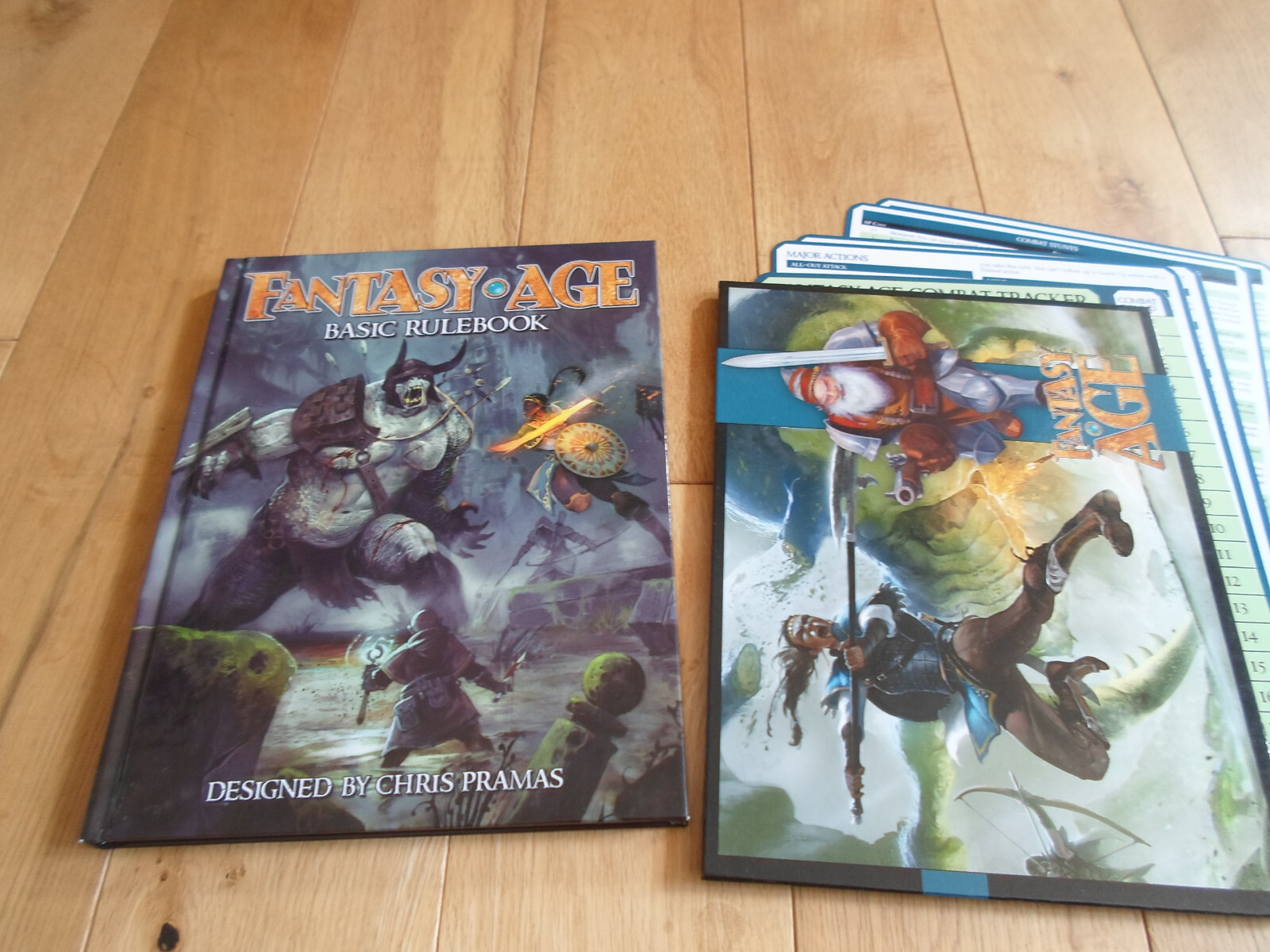 Fantasy AGE Core Hardback Rulebook + GM Screen + Game Aid Sheets (NEW/MINT)