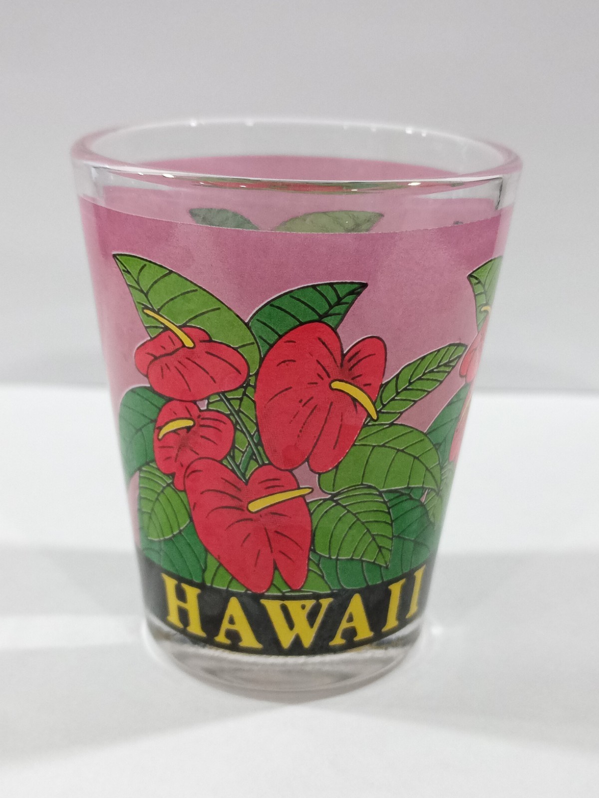 BEAUTIFUL HAWAIIAN FLOWERS LOGO SHOT GLASS GREAT FOR ANY VINTAGE COLLECTION!