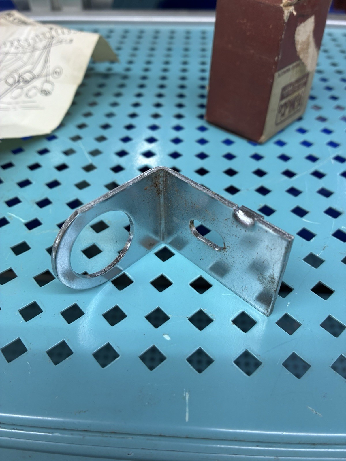1957-58 FORD UNDER DASH CIGAR LIGHTER BRACKET NOS FORD