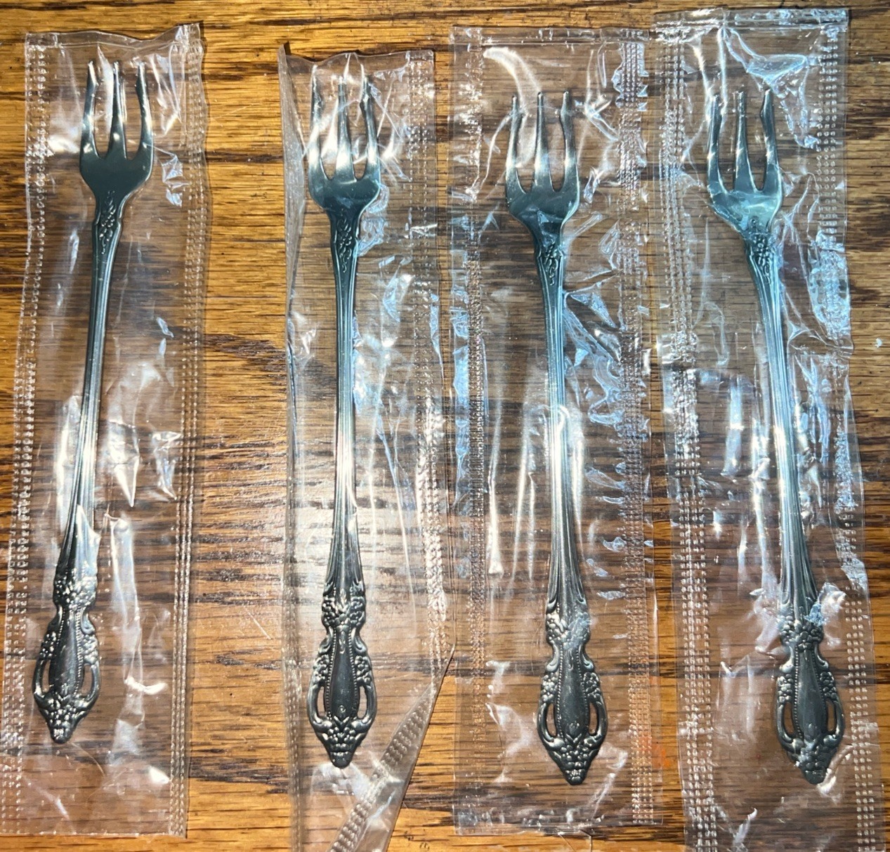 Lot Of 4 Oneida Raphael Cocktail Forks Distinction Deluxe Stainless HH  NEW