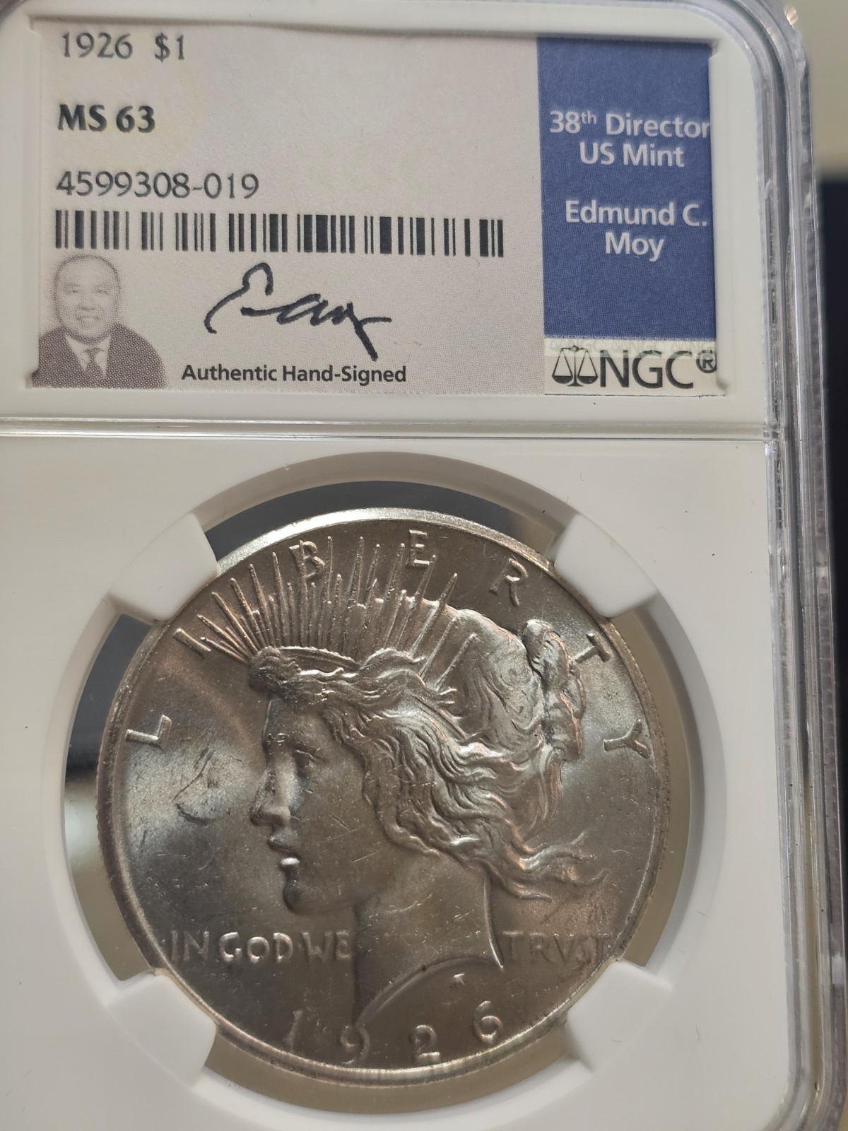 1926 90% Silver Peace Dollar NGC MS-63 Edmond Moy Signed