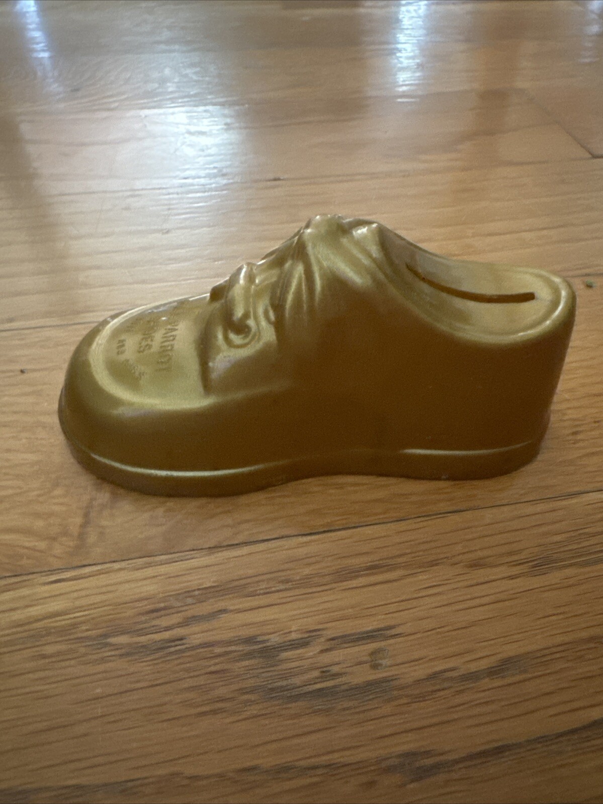 Vintage Small Piggy Bank plastic BABY SHOE poll parrot shoes Advertising Gold