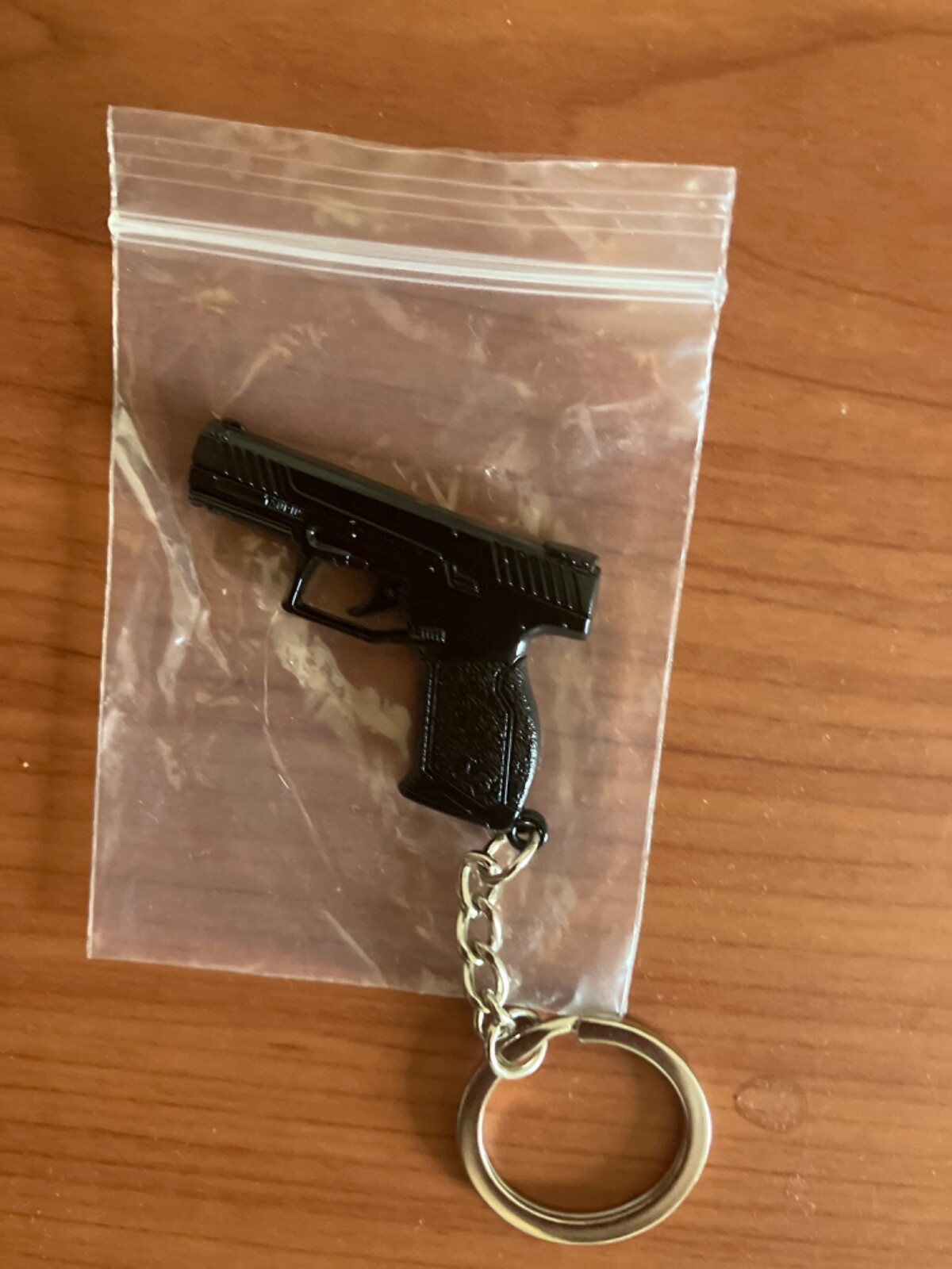 key chains Taurus 9 M Collectors Item 2 inch in size metallic black