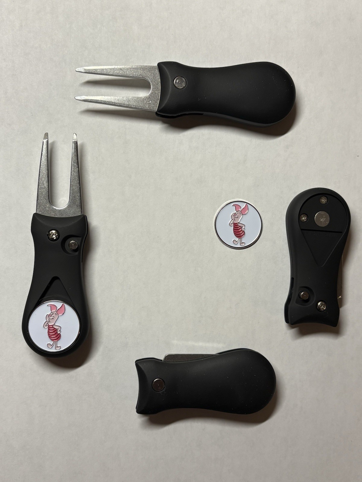 (1)  Switchblade Golf Divot Tool & (1) Winnie The Pooh 'Piglet' Coin Golf Marker