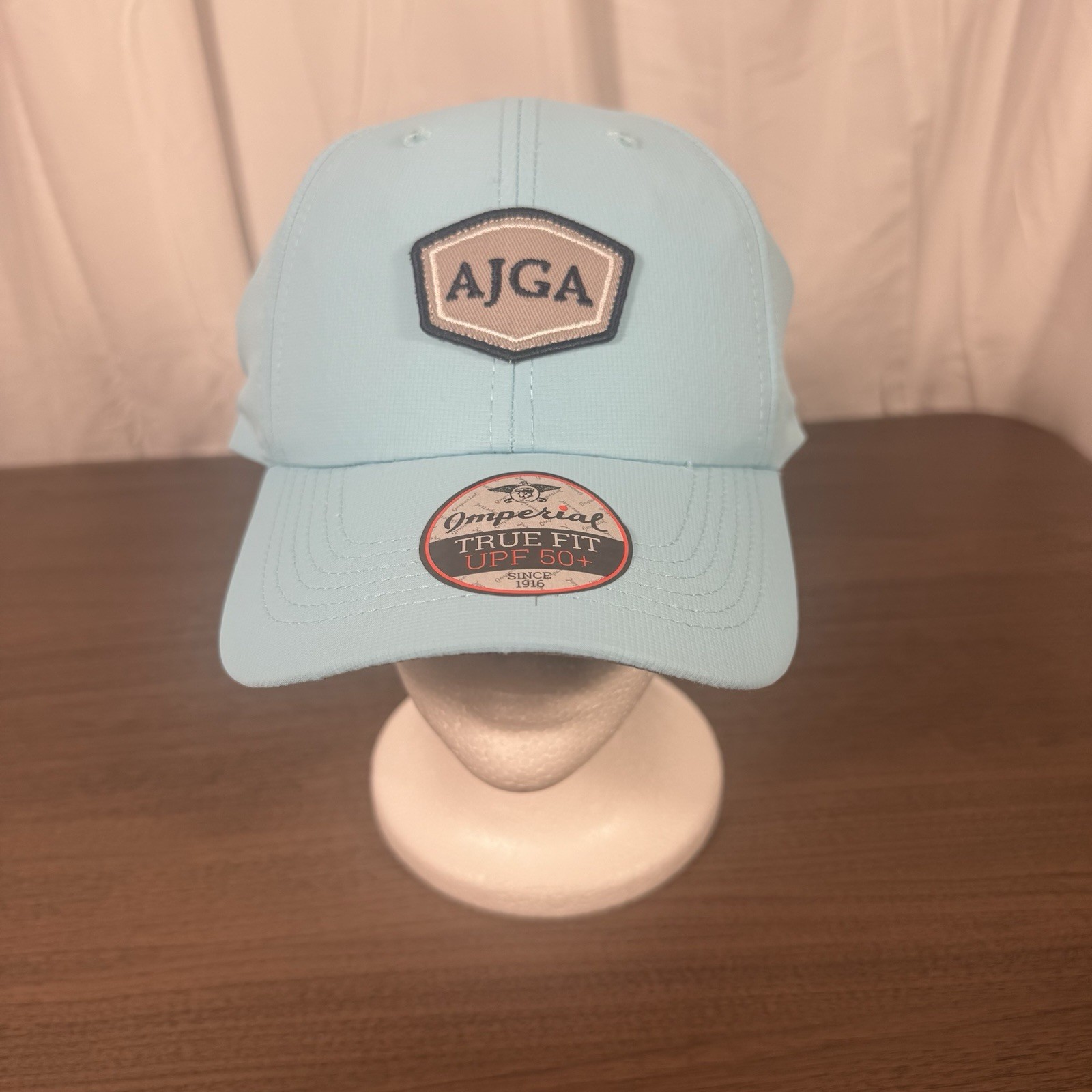 AJGA Golf Hat by Imperial – Light Blue True Fit UPF 50+ Adjustable Cap