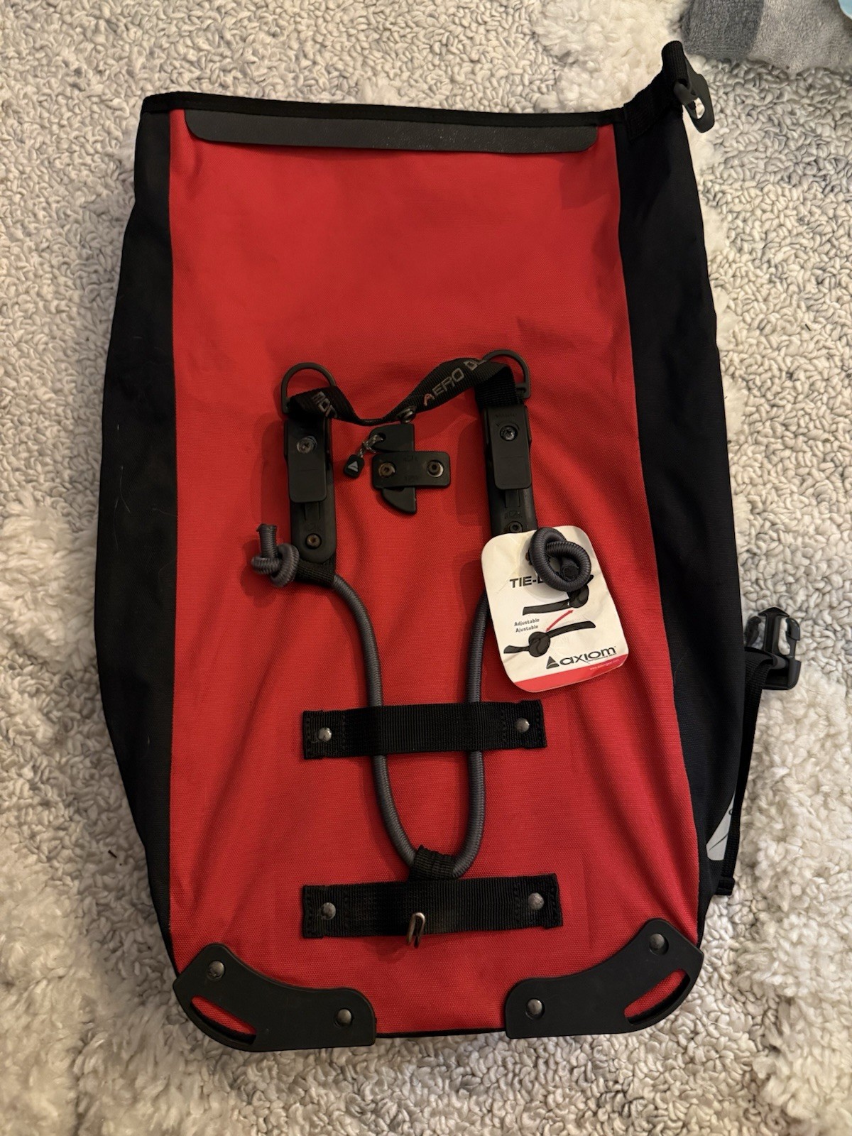 Axiom Tie-Lock Roll-Top Backpack Red/Black Adjustable Straps Buckle Logo