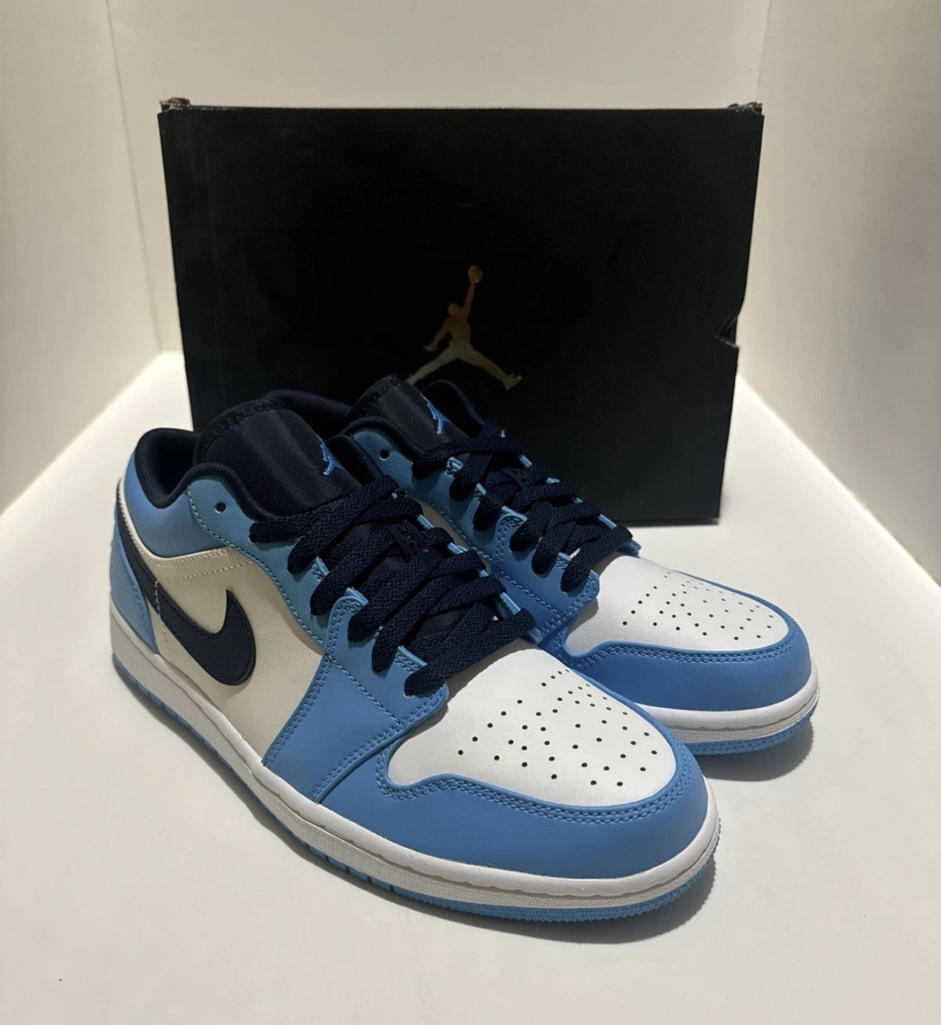 Nike Men’s Air Jordan 1 Low Sneaker, White/Dk Powder Blue-Obsidian, Size 9.5