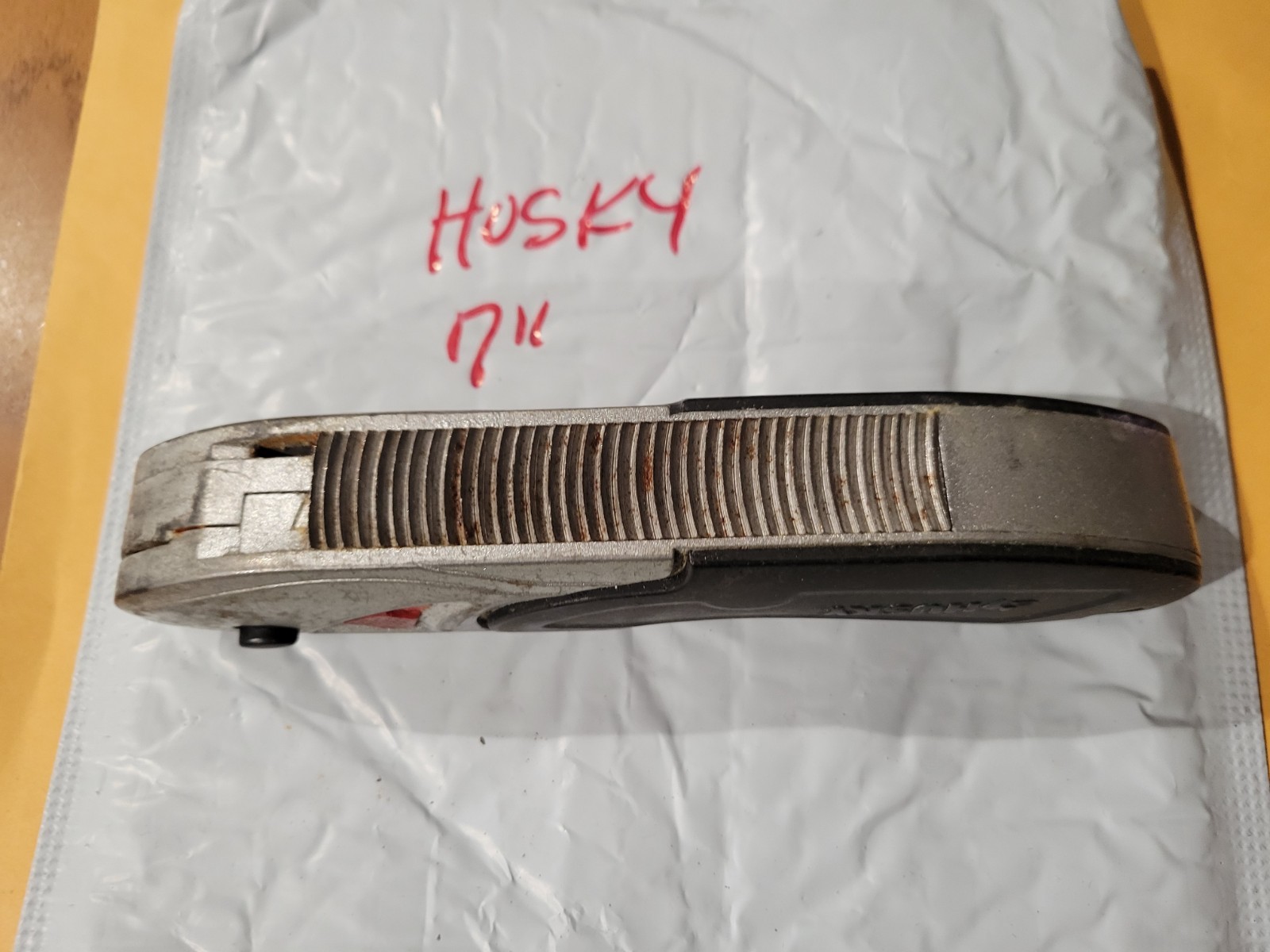 HUSKY 7" MULTI TOOL/KNIFE/ FISHING TOOL GOOD SHAPE