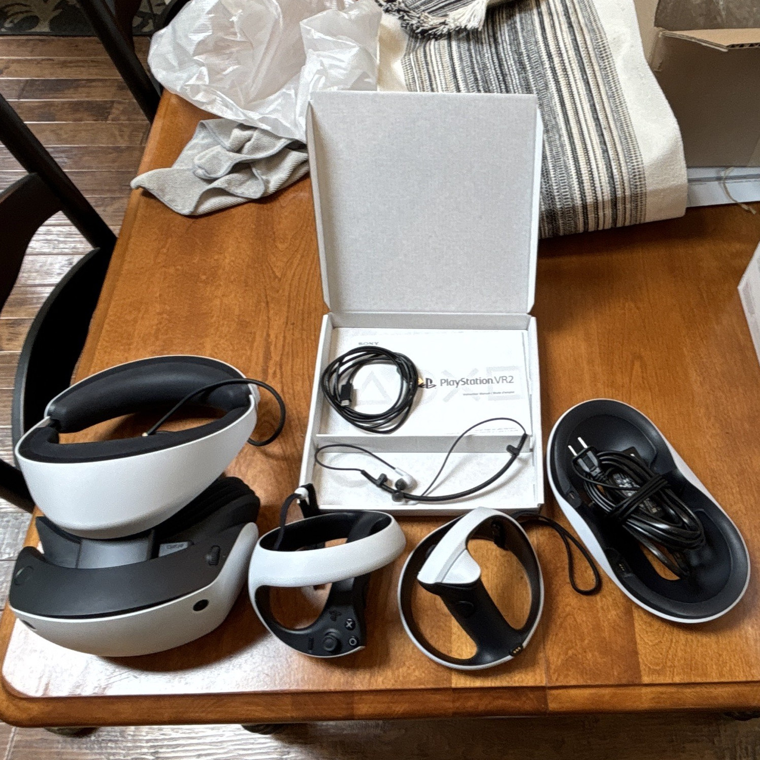 Sony playstation vr2 with controllers, charging dock, no game.
