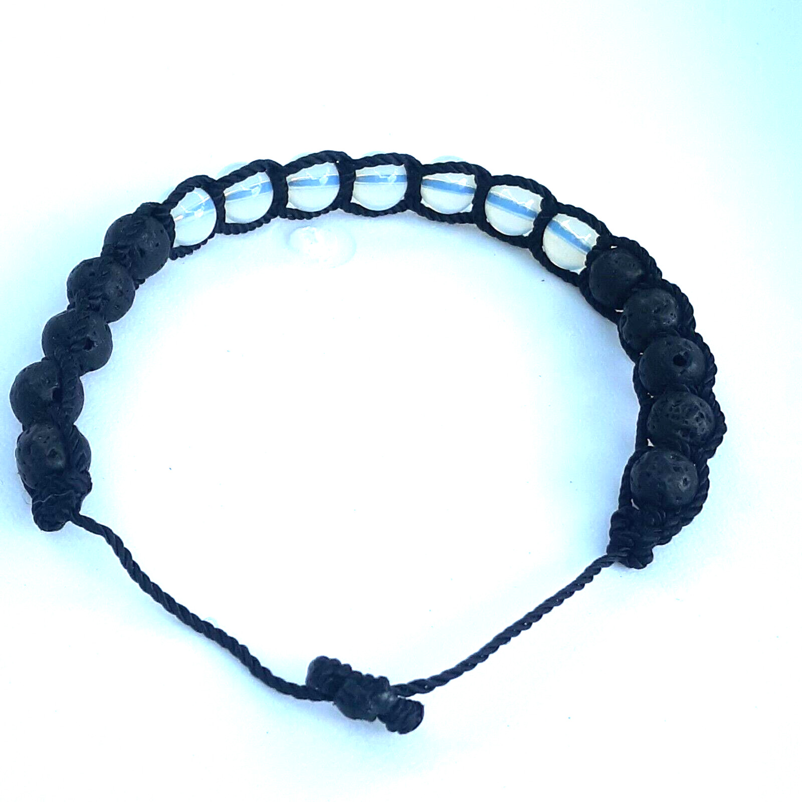 Protection Bracelets 7 Moonstone with 10 Lava beads in black string