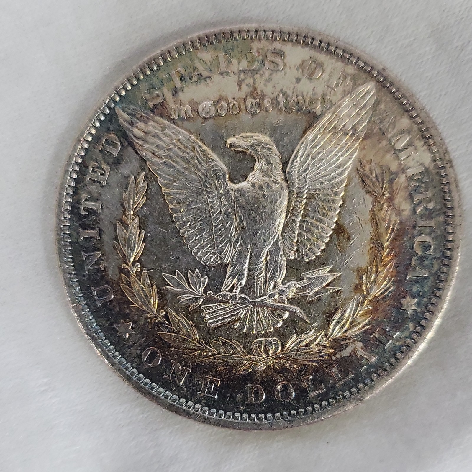 1879 Morgan Silver Dollar in BU Condition with toning on reverse