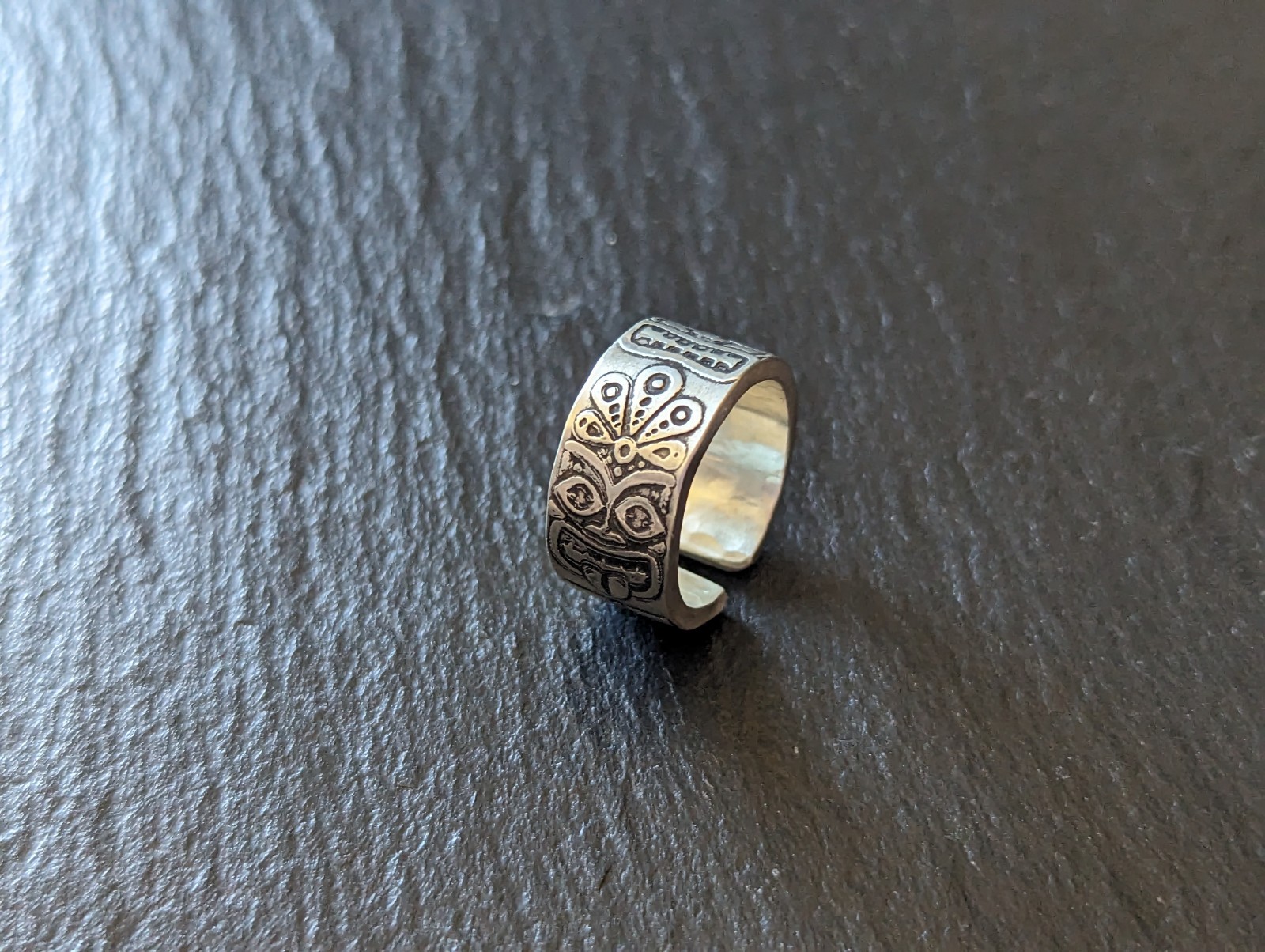 Thick sterling silver ring with tiki gods - handmade - open design