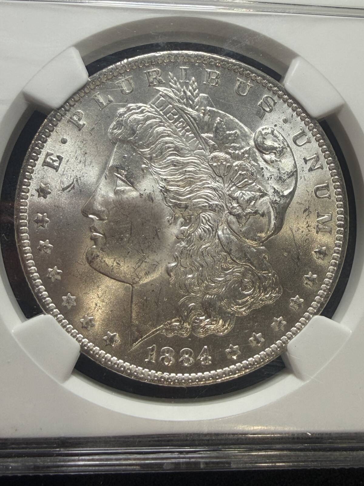 1884 O Morgan Silver Dollar NGC MS-64