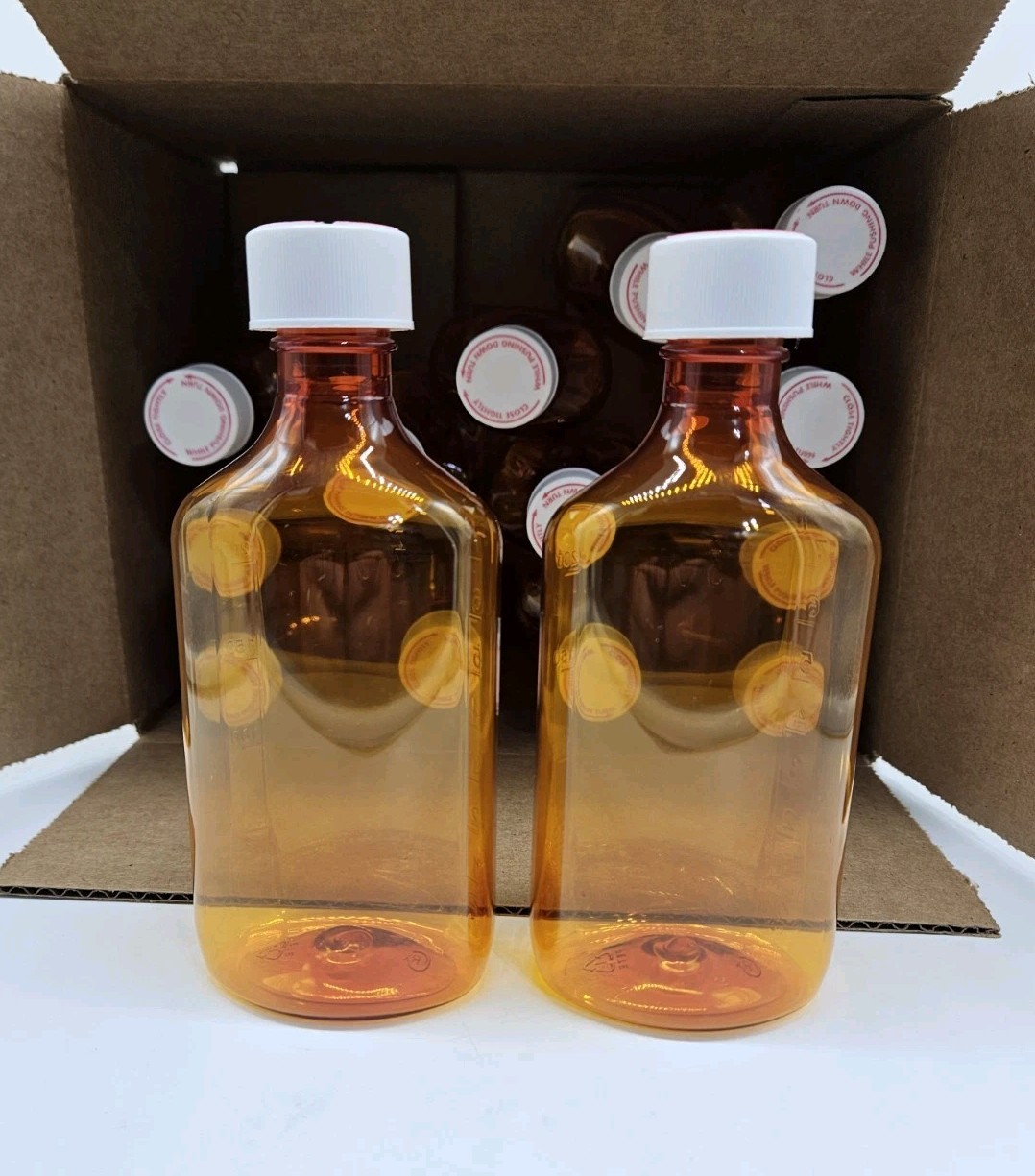12pk  Amber Graduated Ovals Plastic 8oz Bottles with Childproof caps
