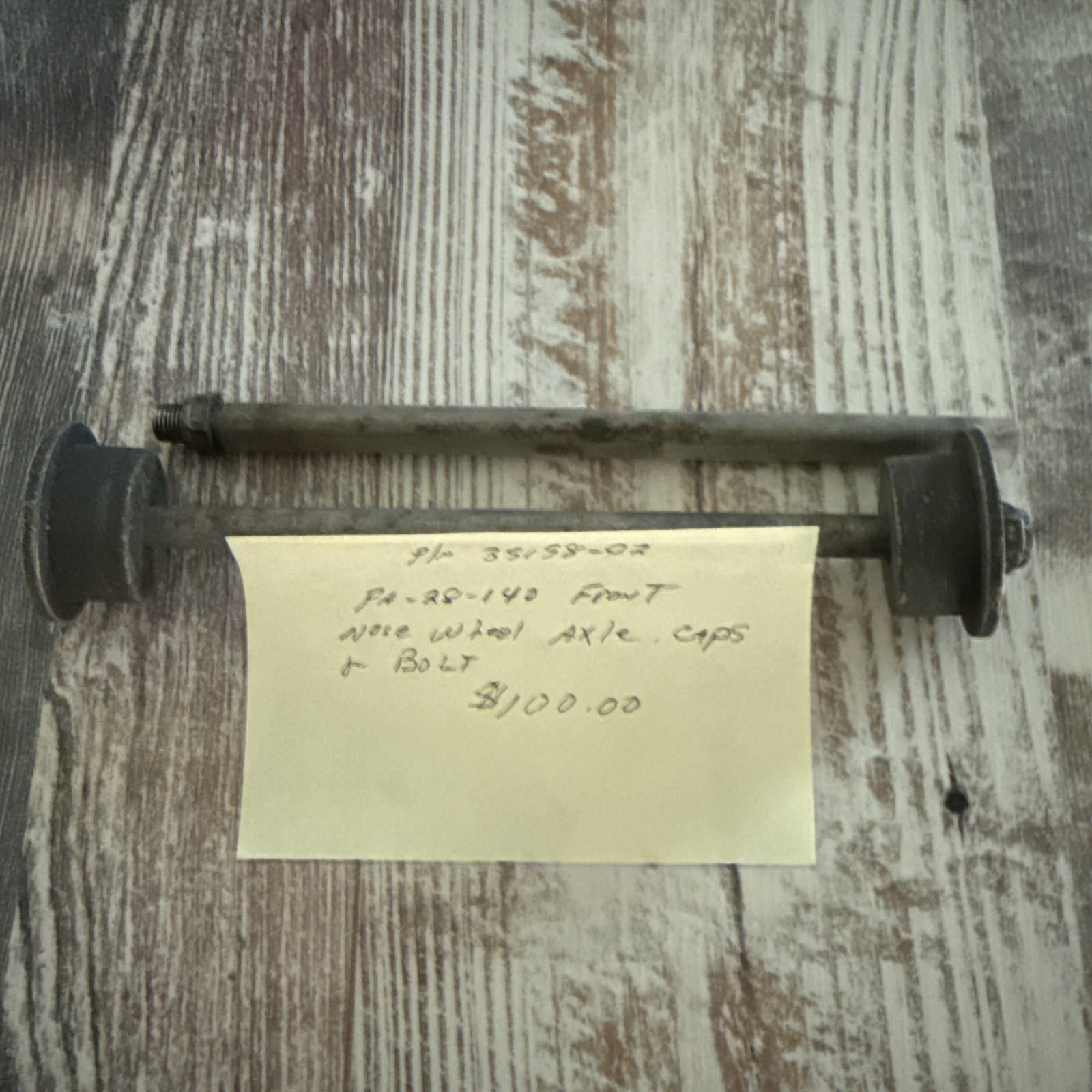 Nose Wheel Axle Caps And Bolts