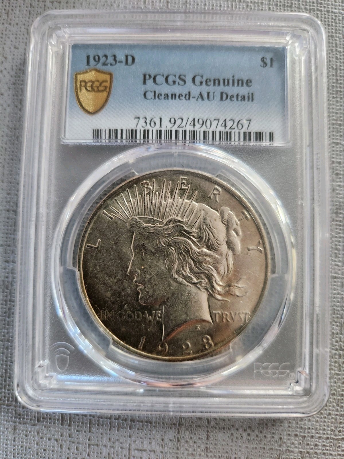 1923 d peace silver dollar, PCGS Genuine AU with details-cleaned
