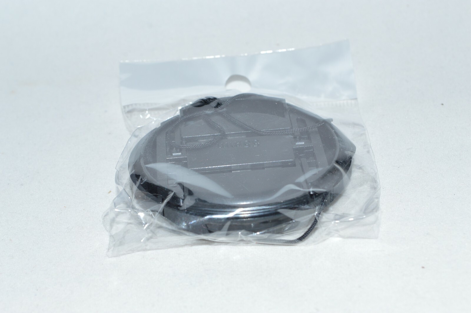 (NEW) Generic 55 mm Rigid Plastic Tab Lock Front Lens Cap. (FLC-215)