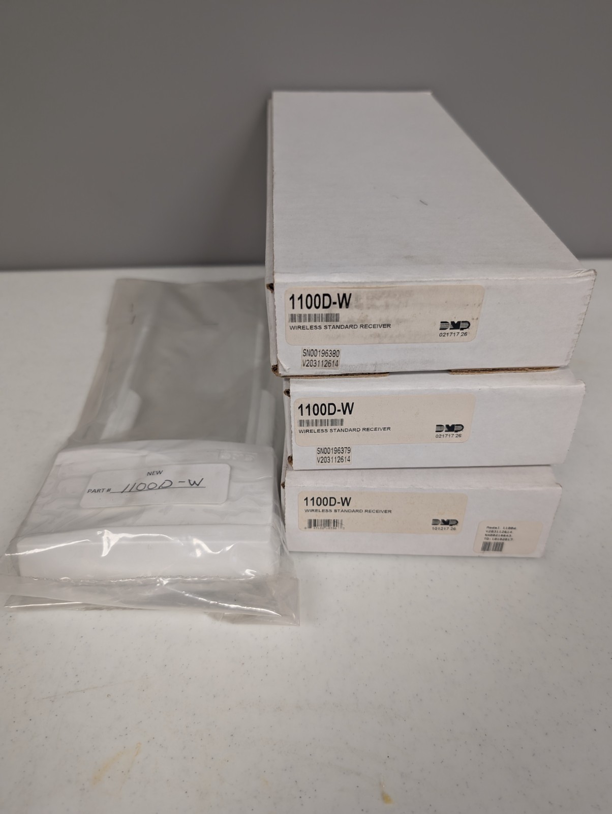 4 New DMP 1100D-W Wireless Standard Receivers for Connecting Sensors to Panels
