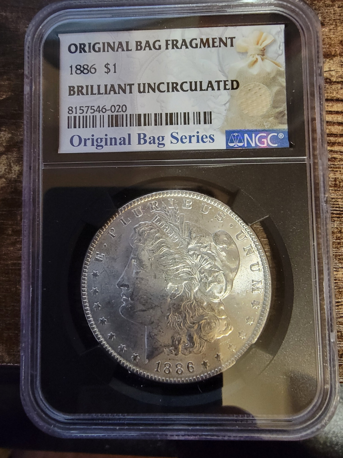 1886 US Morgan Silver Dollar $1 Original Bag Fragment - Brilliant Uncirculated