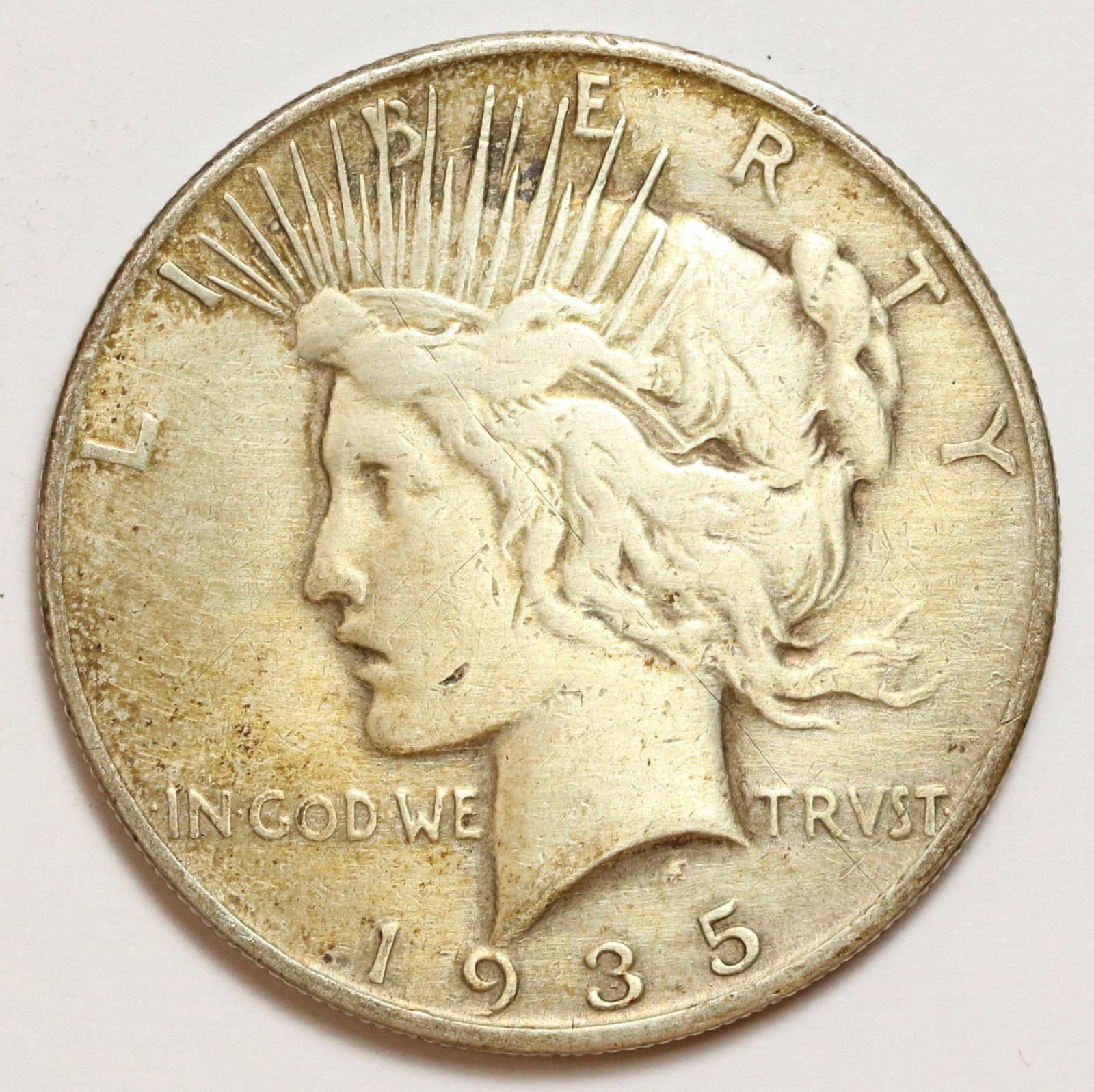 1935-S $1 Silver Peace Dollar - RAW - Nice Better Date Coin - Toned