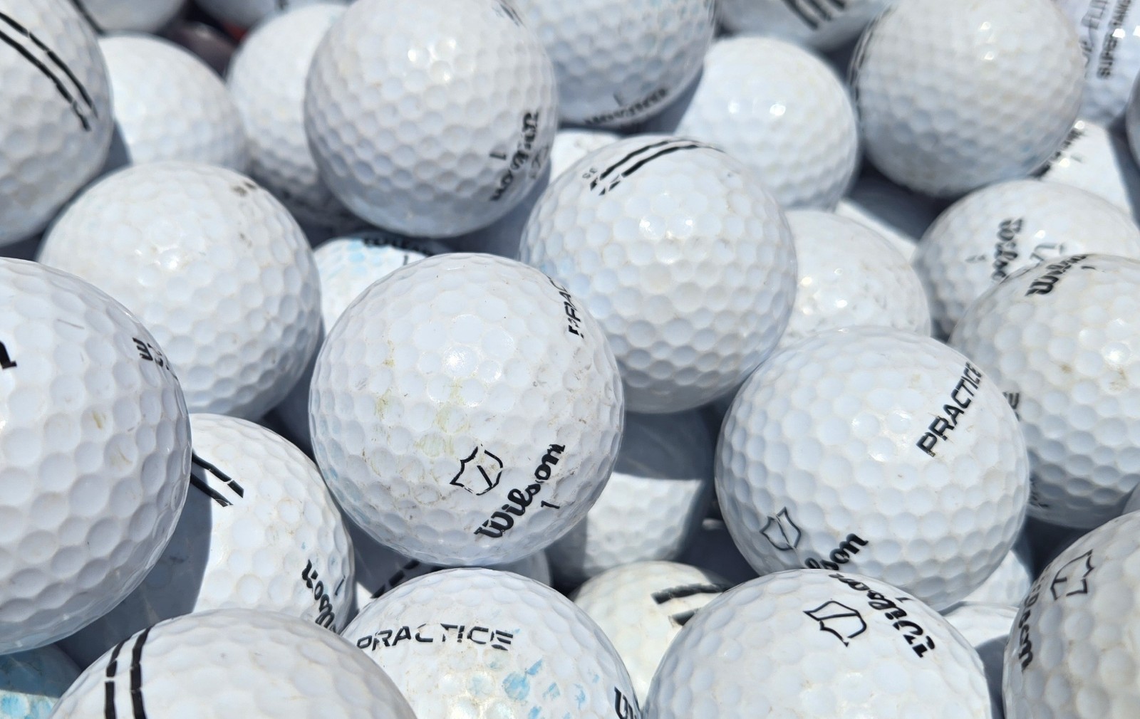 180 Wilson Range Practice golf balls white Grade D.  Free Shipping!