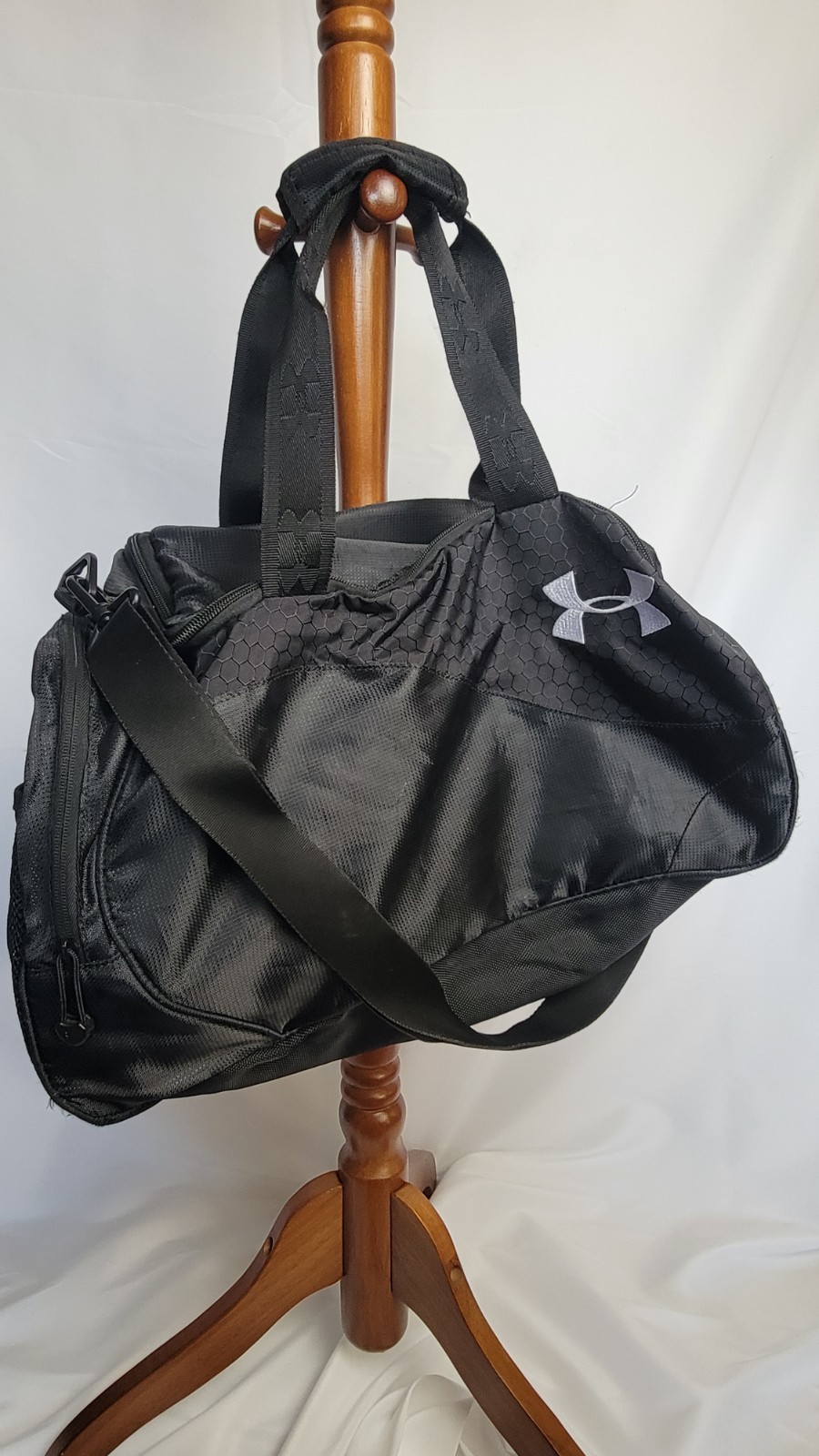 Under Armour duffel bag in black.