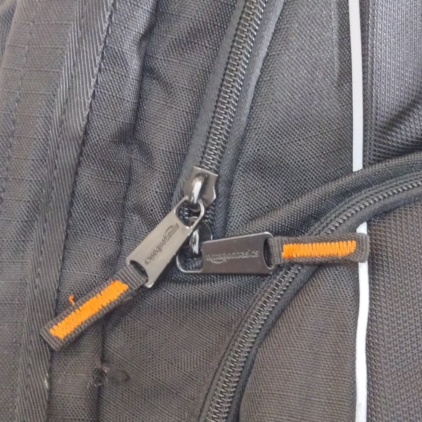 AmazonBasics Black Hiking Backpack Orange Stitching Multiple Compartments