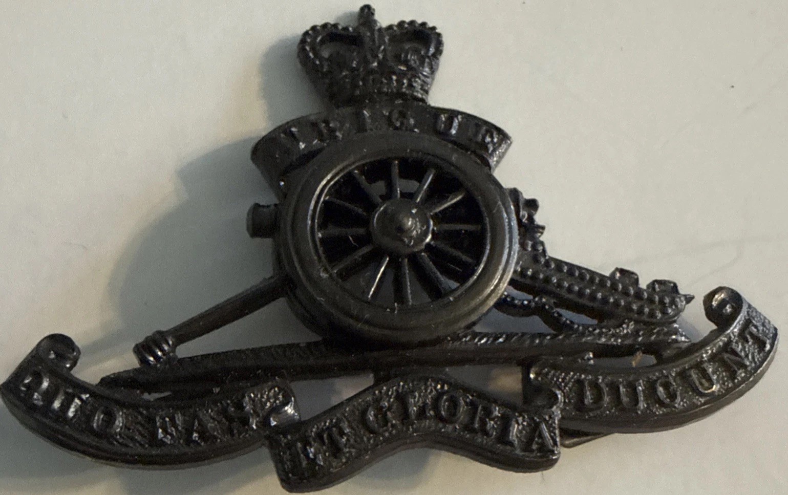 British Army Royal Artillery Queen's Crown officer's bronzed visor cap badge